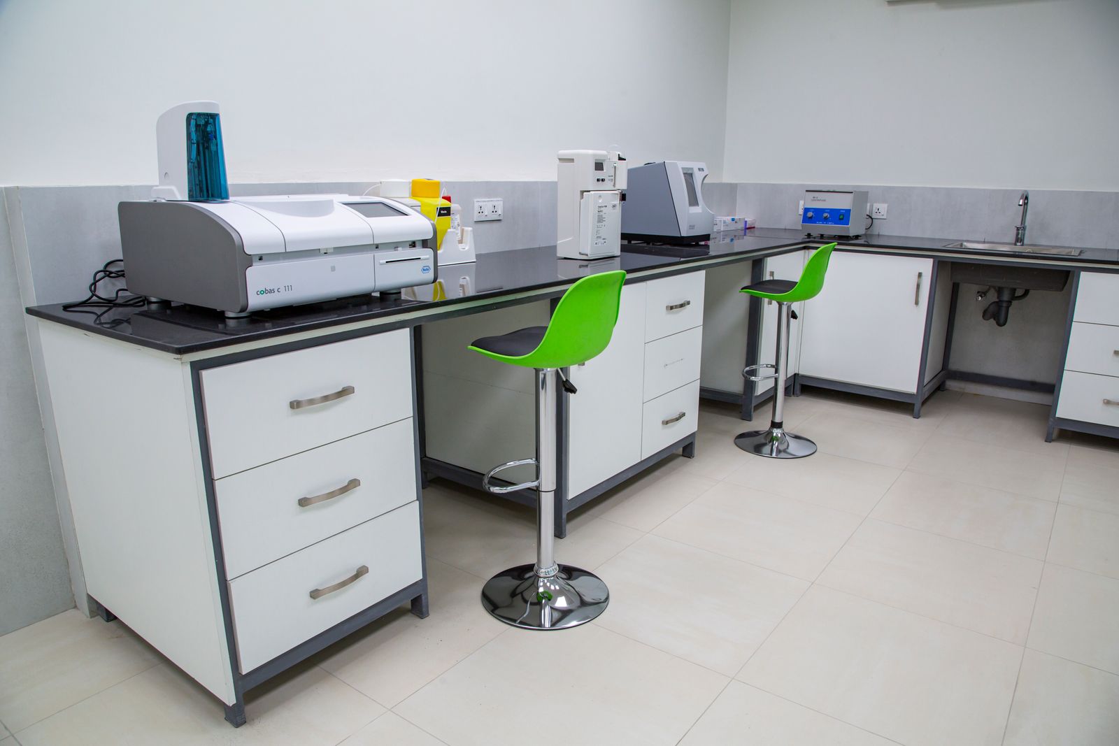 Laboratory interior with instruments and white cabinets